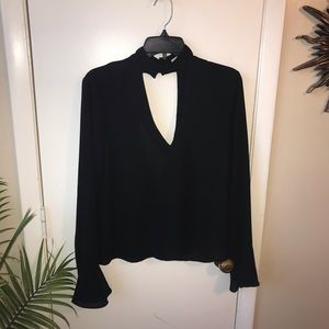 Black flare sleeve top